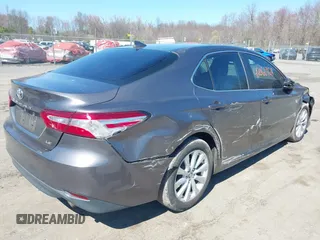 2019 Toyota Camry LE z VIN 4T1B11HK9KU245615, wystawiony jako IAAI lot #42066968 z przebiegiem 130 042 mil mil oraz . Historia ofert i sprzedaży dostępna na DreamBid. Obrazek 4.