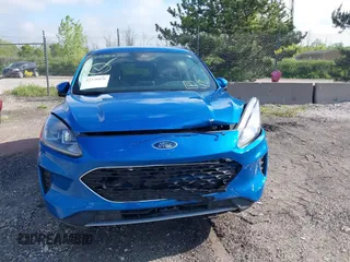2021 Ford Escape SE Hybrid z VIN 1FMCU9BZ7MUA06972, wystawiony jako IAAI lot #42376836 z przebiegiem 57 372 mil mil oraz . Historia ofert i sprzedaży dostępna na DreamBid. Obrazek 12.