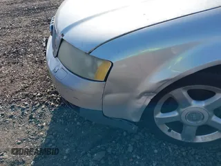 2002 Audi A4 1.8T z VIN WAULC68E12A180056, wystawiony jako IAAI lot #42152742 z przebiegiem Nie podano mil oraz . Historia ofert i sprzedaży dostępna na DreamBid. Obrazek 6.