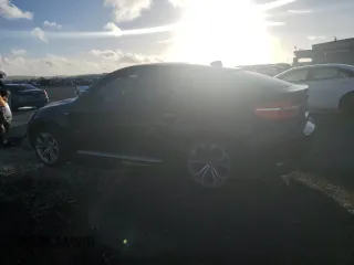 2011 BMW X6 50i z VIN 5UXFG8C56BLZ96125, wystawiony jako Copart lot #45690425 z przebiegiem 69 732 mil mil oraz Szkoda całkowita • Salvage title. Historia ofert i sprzedaży dostępna na DreamBid. Obrazek 2.