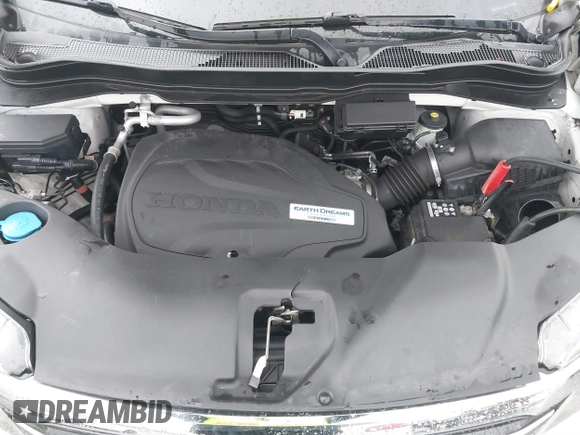 2016 Honda Pilot Touring with VIN 5FNYF6H95GB062089, listed as a IAAI auction lot 41810378 with 74,704 mi miles and . Bid and sale history available at DreamBid. Image 10.