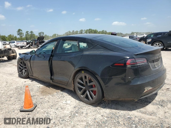 2023 Tesla Model S Plaid with VIN 5YJSA1E62PF511875, listed as a Copart auction lot 65583824 with Not provided miles and Salvage title. Bid and sale history available at DreamBid. Image 2.