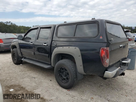 2010 GMC Canyon SLE1 with VIN 1GTJTCDE0A8136926, listed as a Copart auction lot 76193164 with 214,608 mi miles and Salvage title. Bid and sale history available at DreamBid. Image 2.