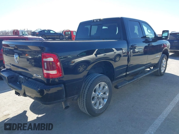 2023 Ram 2500 Laramie with VIN 3C6UR5FL5PG580770, listed as a IAAI auction lot 41734269 with 16,970 mi miles and . Bid and sale history available at DreamBid. Image 4.