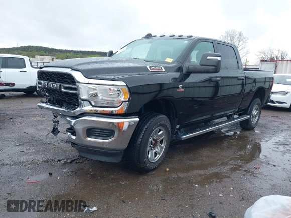 2023 Ram 2500 Tradesman z VIN 3C6UR5CL9PG593221, wystawiony jako IAAI lot #41959202 z przebiegiem 29 303 mil mil oraz . Historia ofert i sprzedaży dostępna na DreamBid. Obrazek 2.