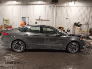 2018 Ford Fusion Hybrid Titanium with VIN 3FA6P0RU4JR147831, listed as a IAAI auction lot 41586033 with 101,088 mi miles. Bid and sale history available at carsss.com. Image 13.