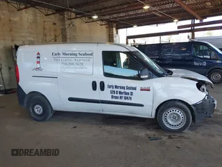 2021 Ram ProMaster City Cargo Tradesman with VIN ZFBHRFAB1M6T92441, listed as a IAAI auction lot 42039946 with 100,036 mi miles and . Bid and sale history available at DreamBid. Image 14.