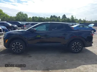 2022 Hyundai Santa Cruz SEL with VIN 5NTJBDAE2NH000464, listed as a IAAI auction lot 42329921 with 32,890 mi miles and . Bid and sale history available at DreamBid. Image 14.