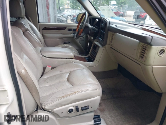 2003 Cadillac Escalade z VIN 1GYEK63NX3R241388, wystawiony jako IAAI lot #42227896 z przebiegiem 154 415 mil mil oraz . Historia ofert i sprzedaży dostępna na DreamBid. Obrazek 5.