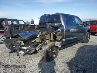 2023 Ford F-150 XL with VIN 1FTEW1EP4PFB38678, listed as a Copart auction lot 43024045 with 8,718 mi miles and Salvage title. Bid and sale history available at DreamBid. Image 3.