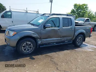 2016 Nissan Frontier Pro-4X with VIN 1N6AD0EVXGN765434, listed as a IAAI auction lot 42485545 with 109,331 mi miles and . Bid and sale history available at DreamBid. Image 14.