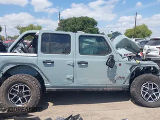 2024 Jeep Wrangler Rubicon with VIN 1C4PJXFG4RW266186, listed as a IAAI auction lot 42043265 with Not provided miles and . Bid and sale history available at DreamBid. Image 13.