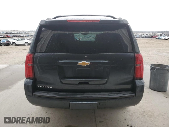 2019 Chevrolet Tahoe LT with VIN 1GNSKBKCXKR212450, listed as a Copart auction lot 54433205 with 119,907 mi miles and Salvage title. Bid and sale history available at DreamBid. Image 6.