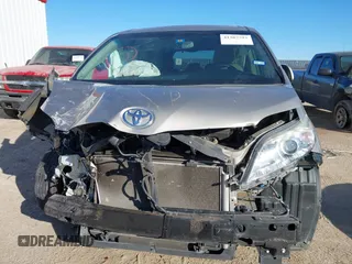 2015 Toyota Sienna XLE with VIN 5TDYK3DC8FS547056, listed as a IAAI auction lot 41387793 with 140,767 mi miles and . Bid and sale history available at DreamBid. Image 13.