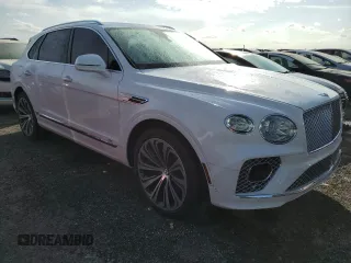 2022 Bentley Bentayga V8 z VIN SJAAM2ZV4NC011285, wystawiony jako Copart lot #75246624 z przebiegiem 33 179 mil mil oraz Nie do naprawy. Historia ofert i sprzedaży dostępna na DreamBid. Obrazek 4.