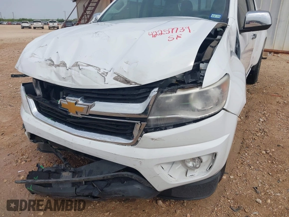 2016 Chevrolet Colorado 2WD LT z VIN 1GCGSCE34G1136732, wystawiony jako IAAI lot #42257739 z przebiegiem 92 592 mil mil oraz . Historia ofert i sprzedaży dostępna na DreamBid. Obrazek 18.