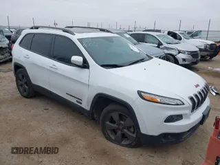 2016 Jeep Cherokee Latitude with VIN 1C4PJLCB0GW350567, listed as a IAAI auction lot 41624430 with 100,371 mi miles. Bid and sale history available at carsss.com. Image 1.