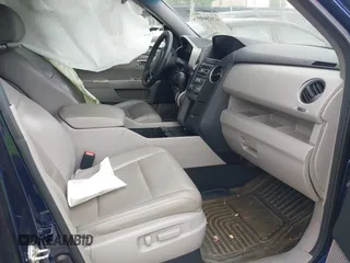 2015 Honda Pilot EX-L with VIN 5FNYF4H56FB040909, listed as a IAAI auction lot 42028609 with 267,375 mi miles and . Bid and sale history available at carsss.com. Image 5.