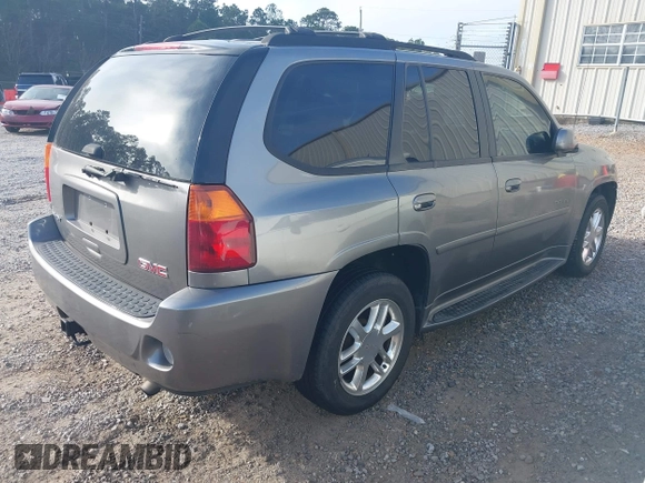 2006 GMC Envoy Denali with VIN 1GKES63MX62154590, listed as a IAAI auction lot 41439465 with 258,975 mi miles. Bid and sale history available at carsss.com. Image 4.