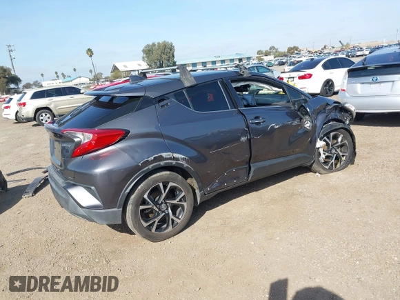 2019 Toyota C-HR XLE with VIN JTNKHMBX3K1018567, listed as a IAAI auction lot 41602932 with 213,386 mi miles and . Bid and sale history available at DreamBid. Image 4.