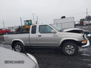 1999 Nissan Frontier XE with VIN 1N6ED26Y3XC307168, listed as a IAAI auction lot 41765751 with 133,127 mi miles and . Bid and sale history available at DreamBid. Image 14.