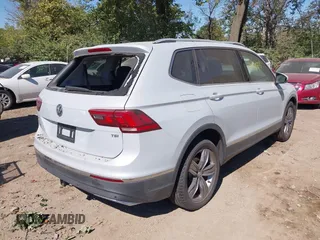2018 Volkswagen Tiguan SEL Premium with VIN 3VV5B7AX5JM004713, listed as a IAAI auction lot 40498843 with 92,256 mi miles and . Bid and sale history available at DreamBid. Image 4.