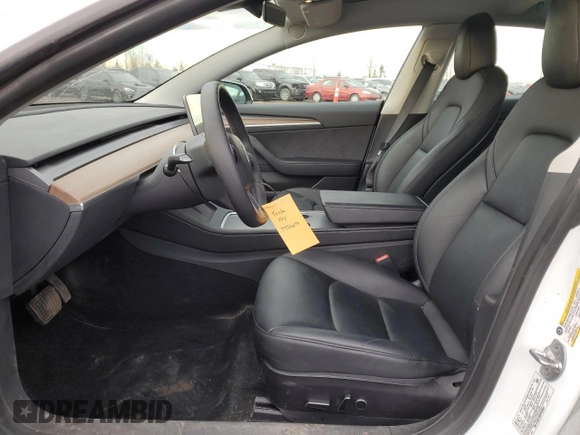 2023 Tesla Model 3 with VIN 5YJ3E1EA5PF484801, listed as a Copart auction lot 79766274 with 83,541 mi miles and Clean Title. Bid and sale history available at DreamBid. Image 7.