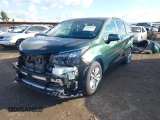 2024 Toyota Sienna XLE with VIN 5TDJSKFC7RS135935, listed as a IAAI auction lot 41409630 with 5,477 mi miles and . Bid and sale history available at DreamBid. Image 2.