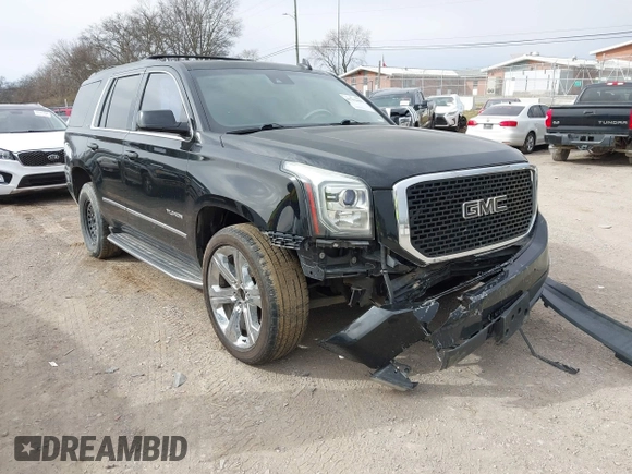 2016 GMC Yukon SLT with VIN 1GKS1BKC3GR272738, listed as a IAAI auction lot 41712439 with 169,726 mi miles. Bid and sale history available at carsss.com. Image 1.