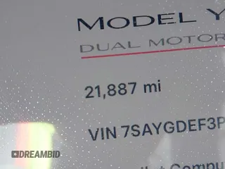 2023 Tesla Model Y Performance with VIN 7SAYGDEF3PF711497, listed as a IAAI auction lot 41877450 with 21,887 mi miles and . Bid and sale history available at DreamBid. Image 15.