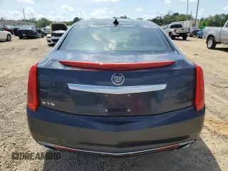 2015 Cadillac XTS Luxury z VIN 2G61M5S32F9169354, wystawiony jako Copart lot #54887215 z przebiegiem 138 795 mil mil oraz Szkoda całkowita • Salvage title. Historia ofert i sprzedaży dostępna na DreamBid. Obrazek 6.