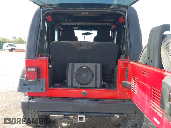 2004 Jeep Wrangler Sport with VIN 1J4FA49S54P744171, listed as a IAAI auction lot 41974657 with 173,230 mi miles. Bid and sale history available at carsss.com. Image 16.