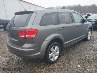2013 Dodge Journey SE with VIN 3C4PDCAB1DT557934, listed as a IAAI auction lot 41420462 with 248,153 mi miles. Bid and sale history available at carsss.com. Image 4.