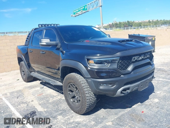 2022 Ram 1500 TRX with VIN 1C6SRFU95NN346475, listed as a IAAI auction lot 39200422 with 14,919 mi miles and . Bid and sale history available at DreamBid. Image 1.