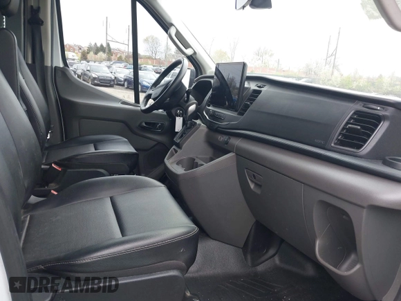 2023 Ford Transit Cargo with VIN 1FTBR1CG5PKA86059, listed as a IAAI auction lot 41951060 with 56,323 mi miles. Bid and sale history available at carsss.com. Image 5.