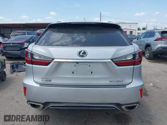 2018 Lexus RX 350 with VIN 2T2BZMCA4JC163019, listed as a IAAI auction lot 42033459 with 96,586 mi miles and . Bid and sale history available at DreamBid. Image 16.