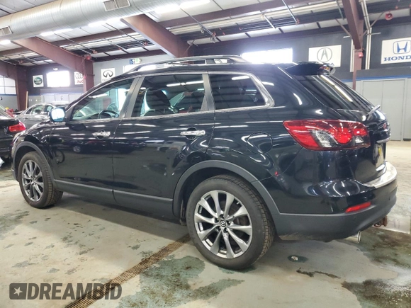 2015 Mazda CX-9 Grand Touring z VIN JM3TB3DVXF0463049, wystawiony jako Copart lot #44909745 z przebiegiem 146 534 mil mil oraz Czysty tytuł • Clean title. Historia ofert i sprzedaży dostępna na DreamBid. Obrazek 2.