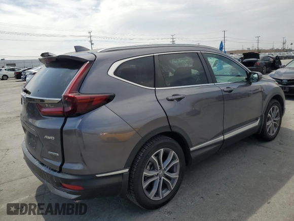 2022 Honda CR-V Touring z VIN 7FARW2H96NE052072, wystawiony jako Copart lot #52214465 z przebiegiem 63 832 mil mil oraz Szkoda całkowita • Salvage title. Historia ofert i sprzedaży dostępna na DreamBid. Obrazek 3.