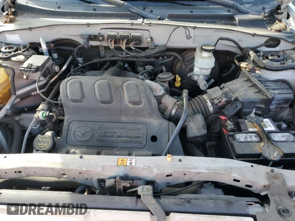 2006 Mazda Tribute S with VIN 4F2YZ06116KM28522, listed as a Copart auction lot 83670154 with Not Provided miles and Non Repairable. Bid and sale history available at carsss.com. Image 12.
