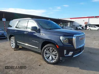 2021 GMC Yukon Denali with VIN 1GKS2DKL5MR144814, listed as a IAAI auction lot 40984358 with 1 mi miles. Bid and sale history available at carsss.com. Image 1.