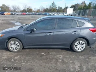 2020 Subaru Impreza with VIN 4S3GTAA66L1714762, listed as a IAAI auction lot 41154150 with 63,009 mi miles. Bid and sale history available at carsss.com. Image 14.