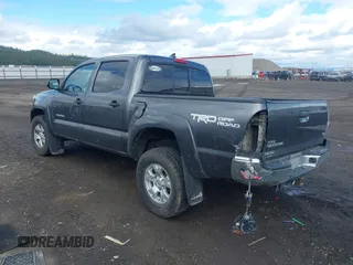 2014 Toyota Tacoma with VIN 3TMLU4EN1EM158171, listed as a IAAI auction lot 41980335 with 193,444 mi miles. Bid and sale history available at carsss.com. Image 3.