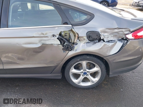 2013 Ford Fusion SE Hybrid with VIN 3FA6P0LU4DR267643, listed as a IAAI auction lot 41846681 with 148,002 mi miles. Bid and sale history available at carsss.com. Image 6.