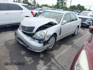 2001 Lexus LS 430 with VIN JTHBN30F110026221, listed as a IAAI auction lot 42022976 with 142,418 mi miles. Bid and sale history available at carsss.com. Image 2.