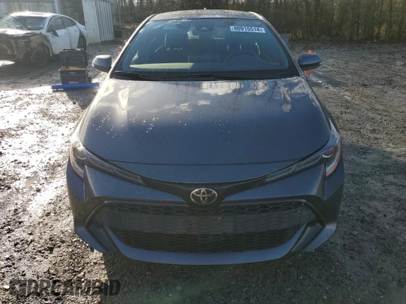 2022 Toyota Corolla Hatchback SE with VIN JTNB4MBE4N3170506, listed as a Copart auction lot 80915514 with 19,792 mi miles and Salvage Title. Bid and sale history available at carsss.com. Image 5.