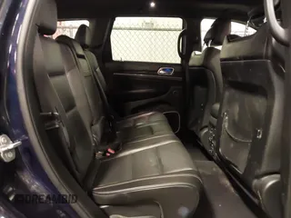 2017 Jeep Grand Cherokee Overland with VIN 1C4RJFCG3HC693897, listed as a IAAI auction lot 41636323 with 105,575 mi miles. Bid and sale history available at carsss.com. Image 8.