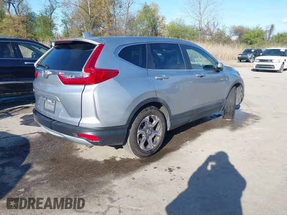 2019 Honda CR-V EX with VIN 5J6RW1H50KA012894, listed as a IAAI auction lot 42044207 with 41,129 mi miles. Bid and sale history available at carsss.com. Image 4.