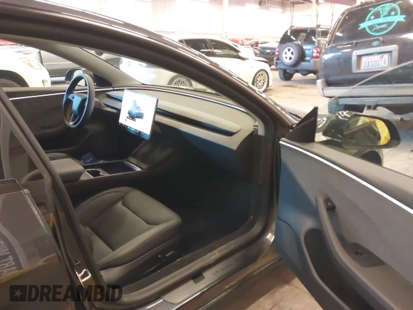 2024 Tesla Model 3 with VIN 5YJ3E1EA9RF835440, listed as a IAAI auction lot 41255559 with 4,789 mi miles. Bid and sale history available at carsss.com. Image 5.