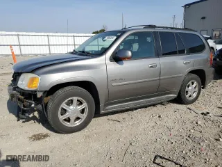 2005 GMC Envoy Denali with VIN 1GKET63M652379567, listed as a Copart auction lot 77862334 with 246,345 mi miles and Non Repairable. Bid and sale history available at carsss.com. Image 1.