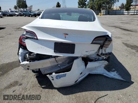 2021 Tesla Model 3 Long Range z VIN 5YJ3E1EB2MF007067, wystawiony jako Copart lot #52584715 z przebiegiem 31 311 mil mil oraz Szkoda całkowita • Salvage title. Historia ofert i sprzedaży dostępna na DreamBid. Obrazek 6.